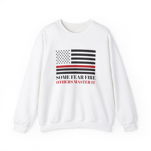 Firefighter Unisex Heavy Blend Crewneck Sweatshirt – Some fear fire, others master it